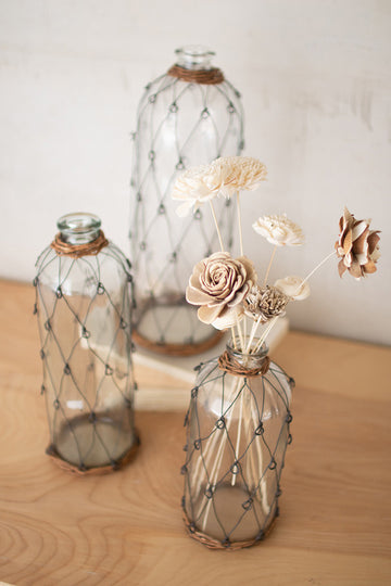 Wire and Wicker Wrapped Glass Bottle